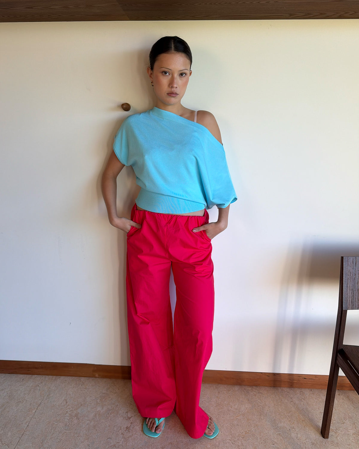 BODE BATWING SHORT SLEEVE TOP AQUA | Off-shoulder batwing short sleeve top crafted in a mid-weight aqua knit. This top is simple yet elevated and can be worn on or off the shoulder. Pair it with denim for a chic everyday look.