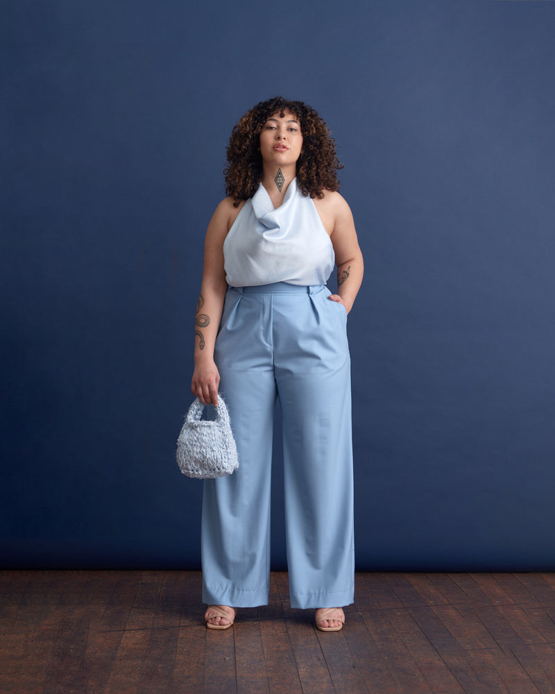 LAFAYETTE PANT POWDER BLUE | Highwaisted wide leg suit pant with front tucks to add fullness. Tailored from a soft blue cupro, these pleated pants have a sweeping wide leg silhouette, in a petite length.