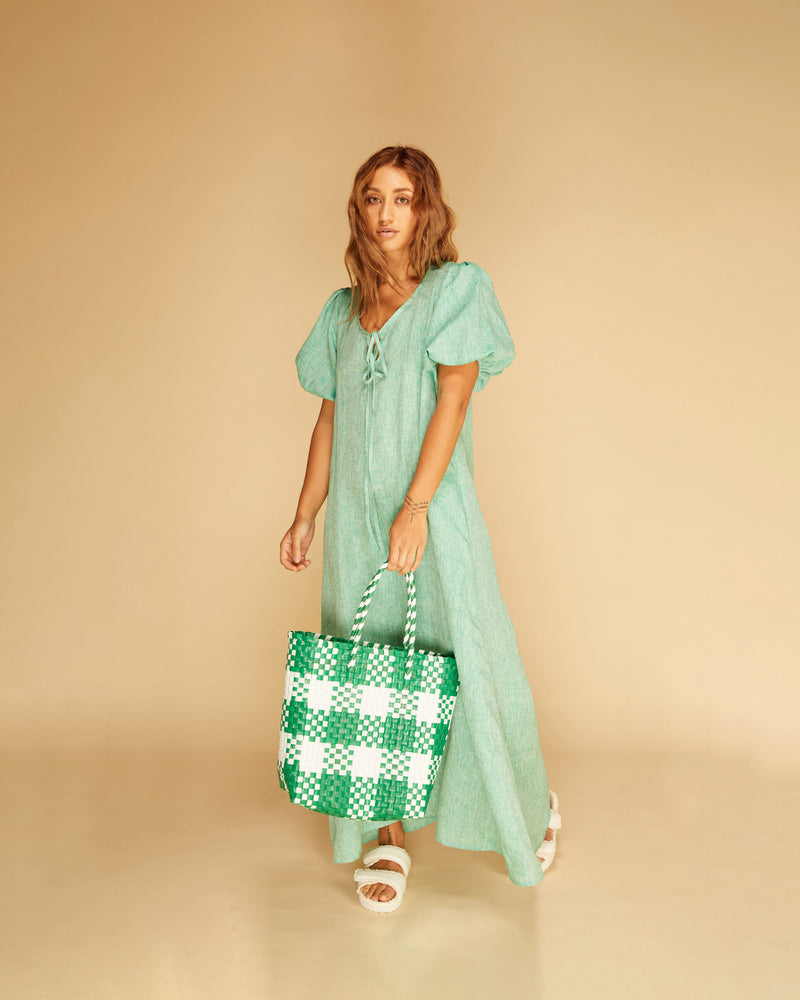 ANGEL LINEN MAXI DRESS GREEN MARLE | Relaxed fit maxi dress with elasticated puff sleeves and a tie neckline with a keyhole detail. Crafted in an airy linen the puff sleeves add a romantic feel to this...