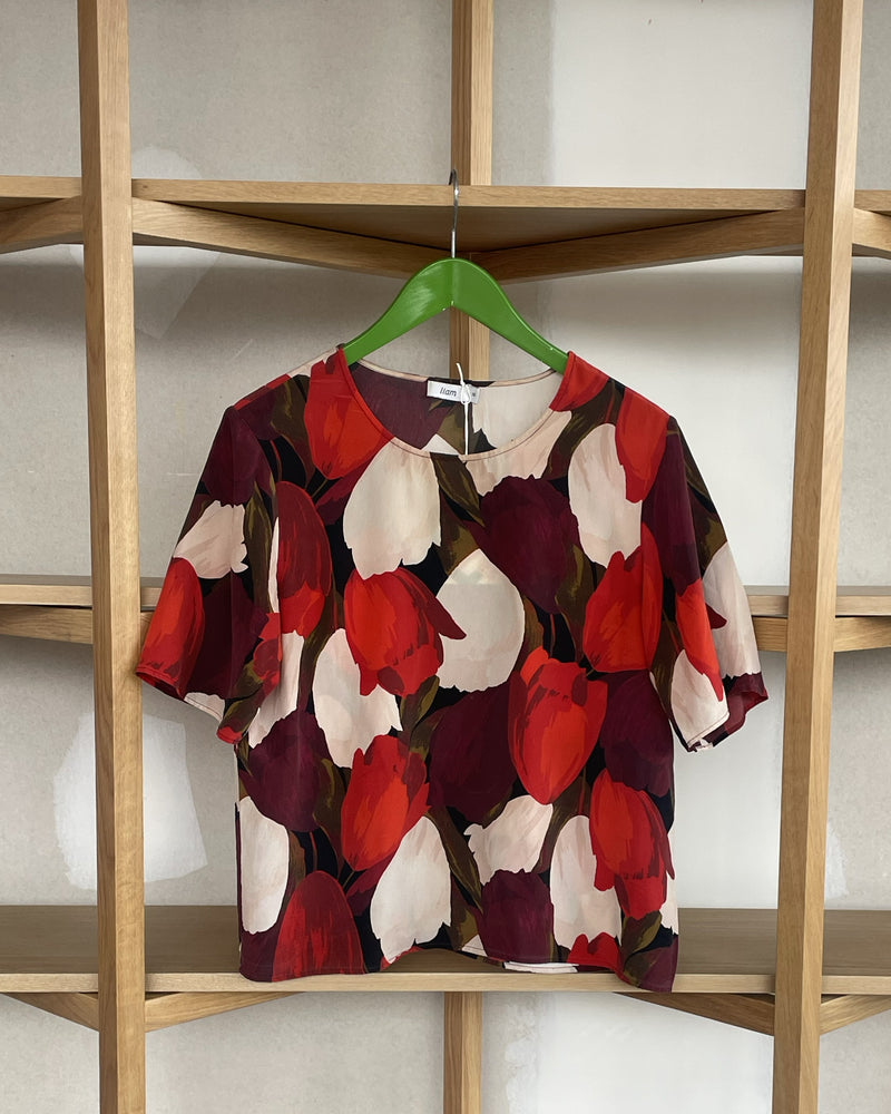 LIAM SILK TULIP TOP TBF00579 | This piece is second hand and therefore may have visible signs of wear. But rest assured, our team has carefully reviewed this piece to ensure it is fully functional &...
