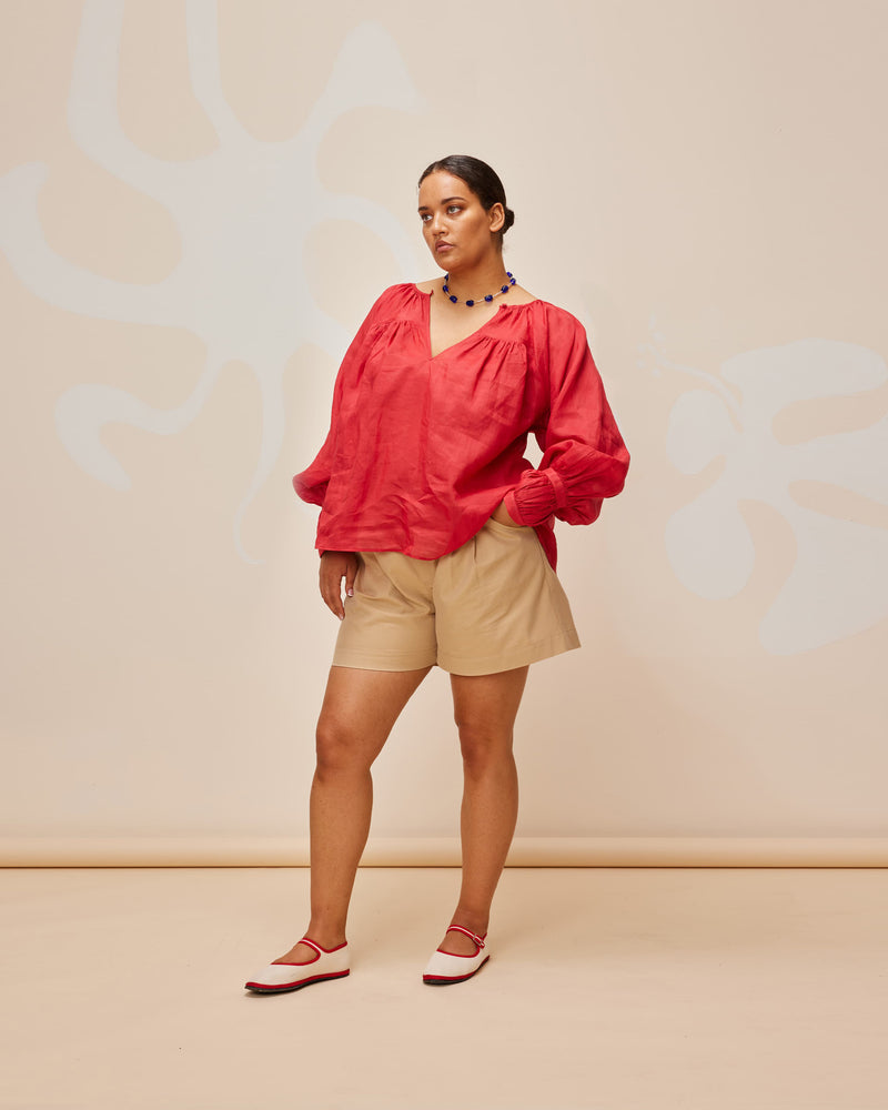 KAI BLOUSE SANGRIA | Oversized flowy blouse with a self-covered button closure at the neckline, made from a delicate translucent ramie voile. Floaty in form, this blouse is that transeasonal staple in your wardrobe.