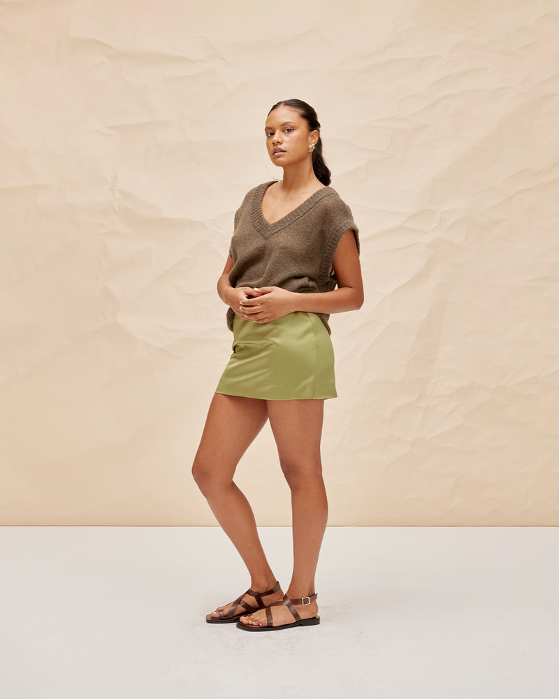 WATERMELON VEST KHAKI | Oversized sleeveless sweater vest, made in a lightweight wool blend with ribbed hem details. This piece is perfect for playing with layering.