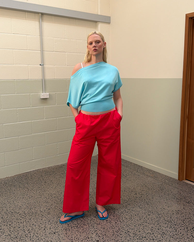 SONNY PANT CHERRY | Straight leg cotton pant with a flat elastic waistband, designed in butter and navy striped cotton. These pants sit relaxed and wide and have side and back pockets, with a feature embroidered RUBY 'R' on the back pocket. Make it...