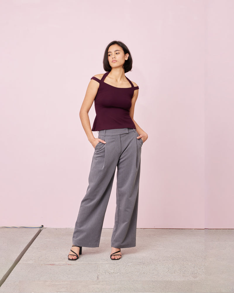 CALVIN TOP PLUM | 
Sleeveless stretch top with feature halter strap and off shoulder straps. Designed for a close fit, this top is an elevated wardrobe staple.