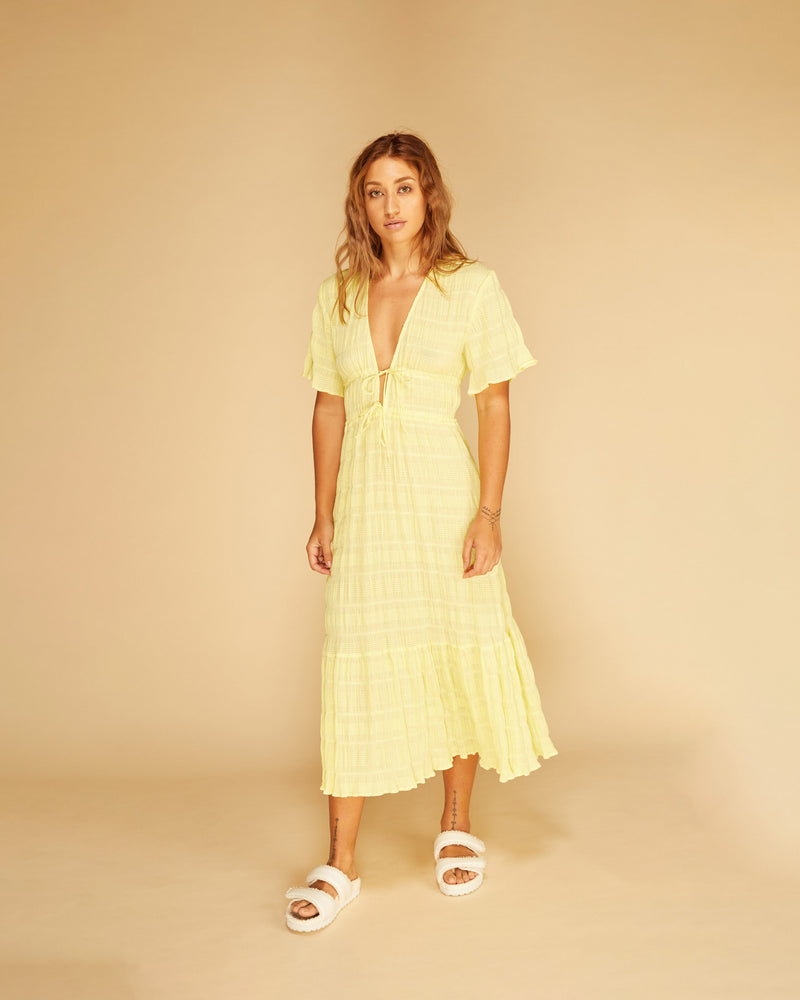 MIRELLA V-NECK DRESS LEMON | Short sleeve midi dress with a deep V-neckline and a double drawstring waist in the signature Mirella fabric, a delicate embroidered cotton. A timeless silhouette appropriate for every occasion.