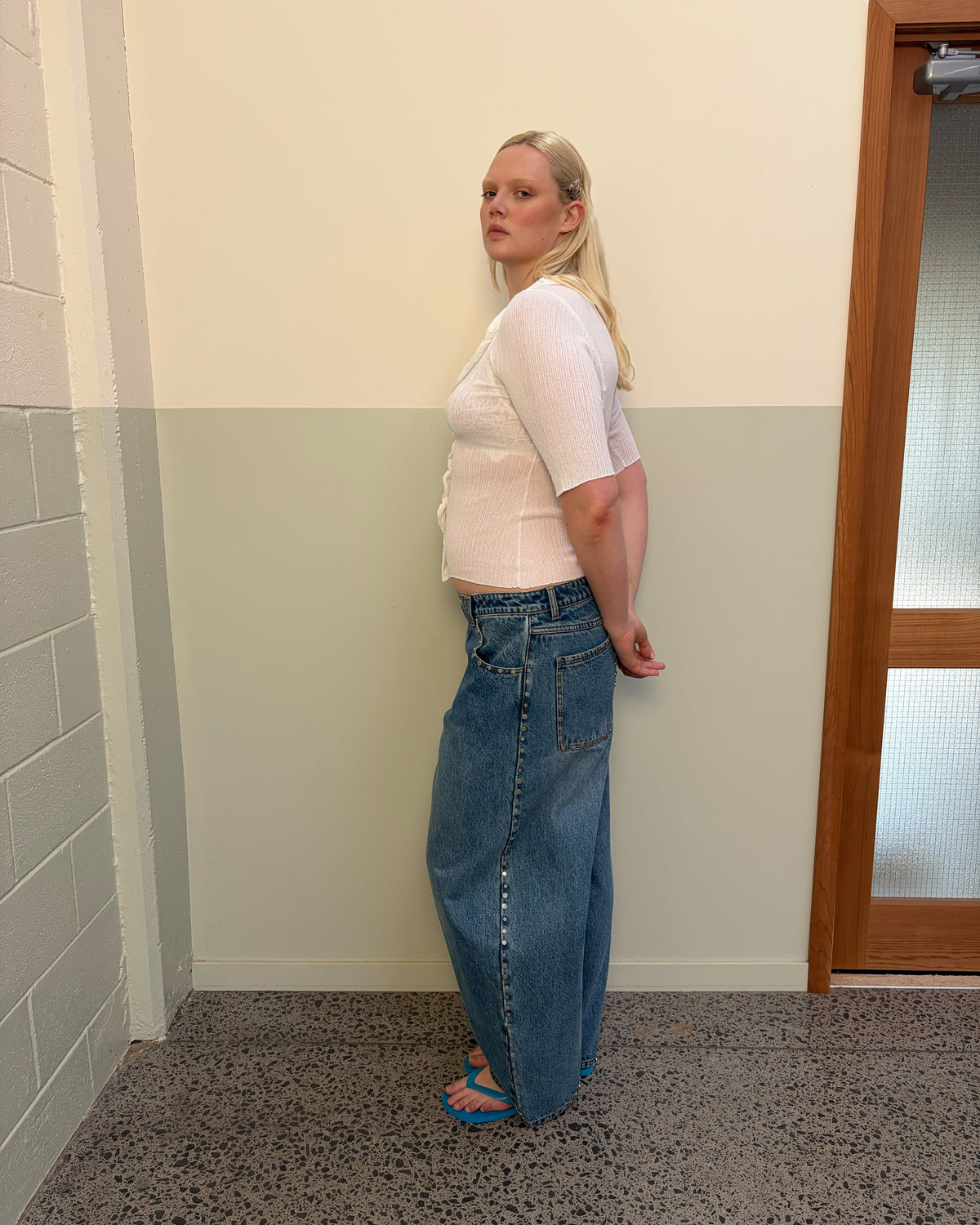 ICON STUDDED JEAN MIDTOWN BLUE | Barrel-leg jean designed in our signature midtown blue wash denim with studded seams. Sits mid to high-waisted with classic 5 pocket and waistband detailing. An updated version of our Icon Jean.