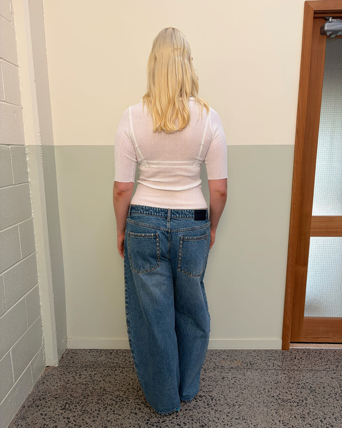 ICON STUDDED JEAN MIDTOWN BLUE | Barrel-leg jean designed in our signature midtown blue wash denim with studded seams. Sits mid to high-waisted with classic 5 pocket and waistband detailing. An updated version of our Icon Jean.