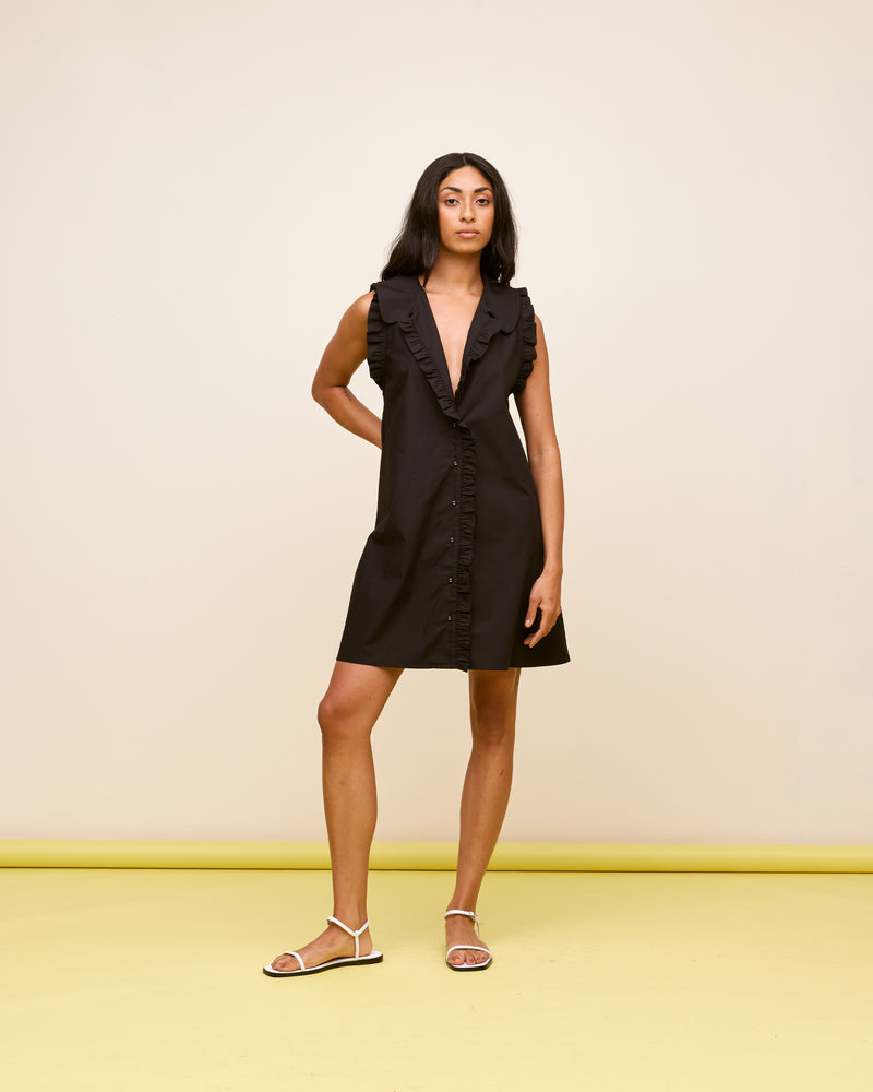 SANDLER MINIDRESS BLACK | Button down cotton mini dress with a feature ruffled collar and ruffles down the placket. Feature side pockets and an A-line silhouette.