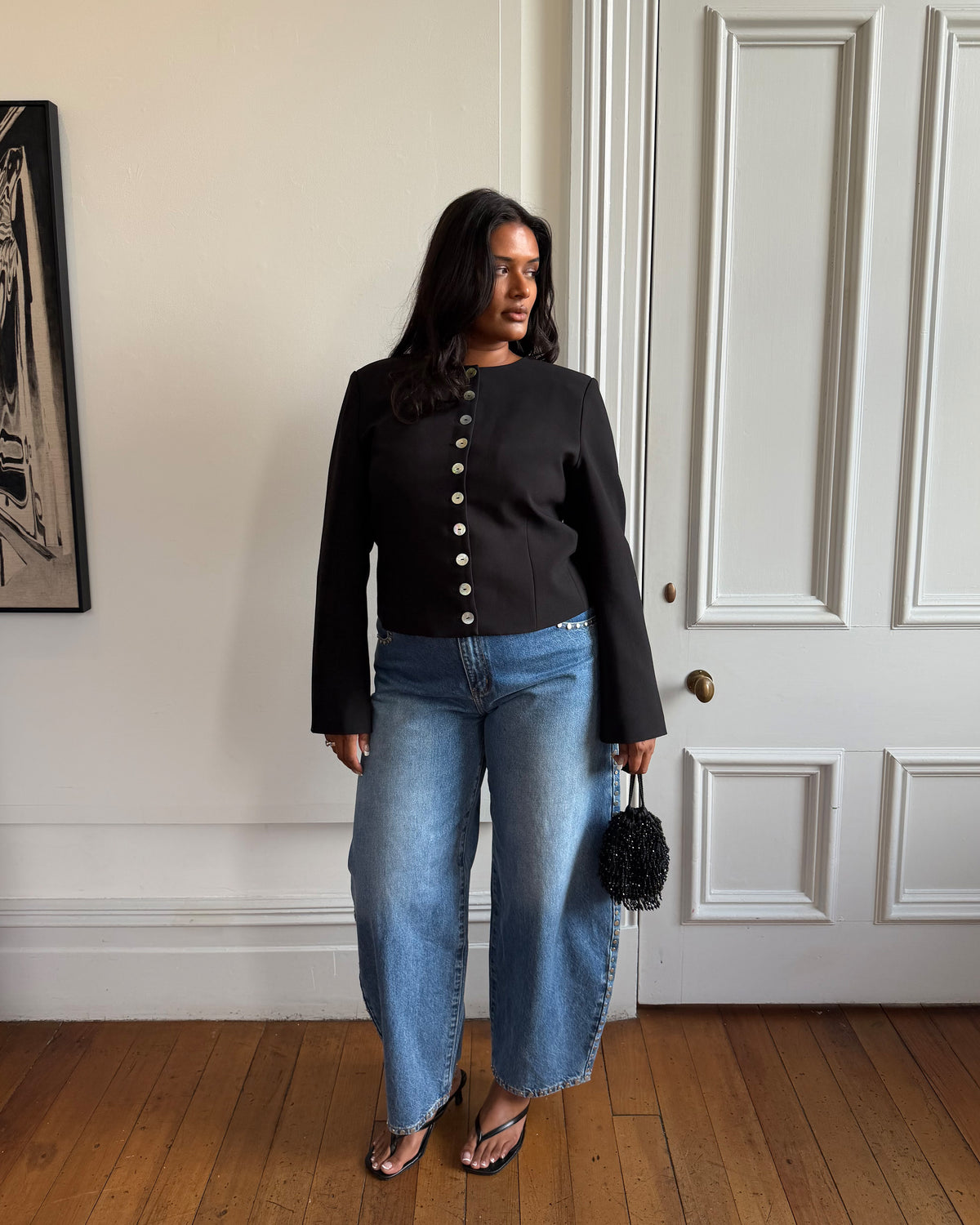CAROLYN BLAZER BLACK | Collarless long sleeve black blazer with feature pearlescent buttons.  An elevated classic with a structured silhouette, this top is the perfect addition to your everyday workwear rotation. Pair with your favourite trousers, or denim for a more casual look.   RUBY...
