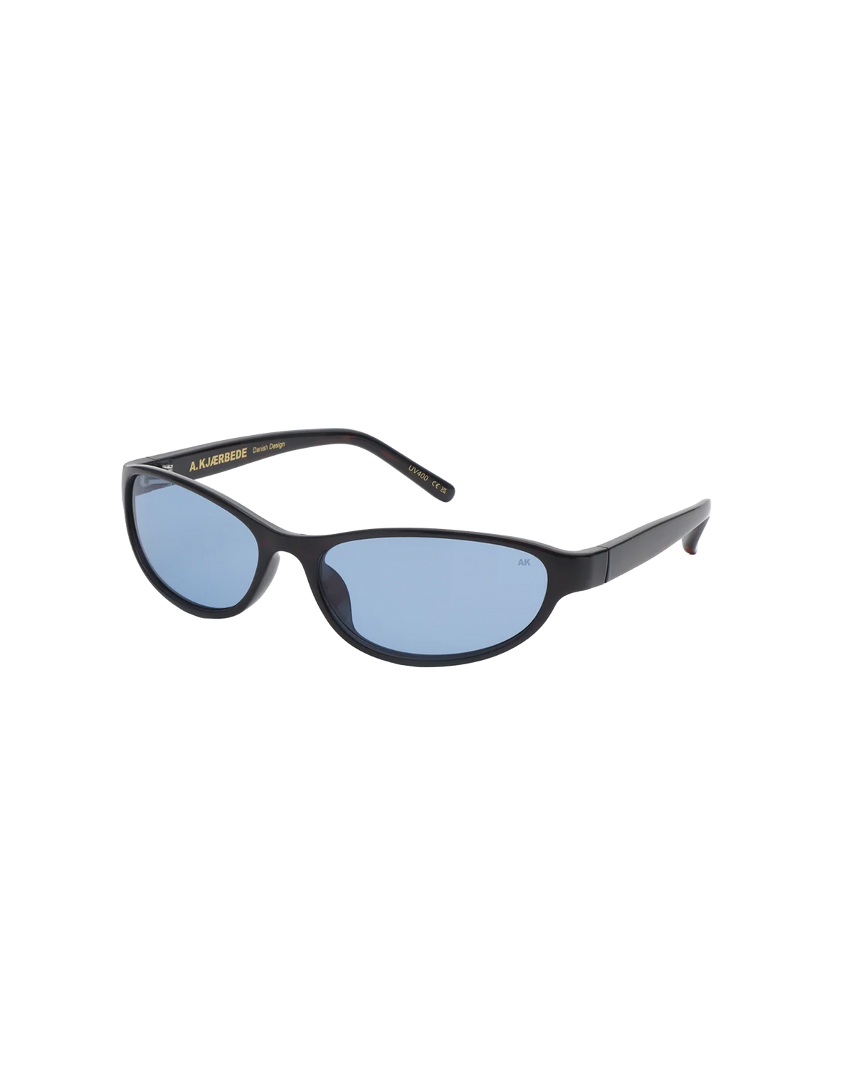 ALEXA SUNGLASS DEMI TORTOISE | Slim sunglasses with a futuristic and refined expression. Designed with a brown cat-eye shape lens and demi-tortoise frames.