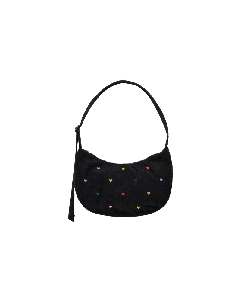 MEDIUM NYLON CRESCENT BAG EMBROIDERED HEARTS | Crescent shaped nylon bag with a feature 'BAGGU' strap. An adjustable strap gives you multiple ways and lengths to wear this bag.