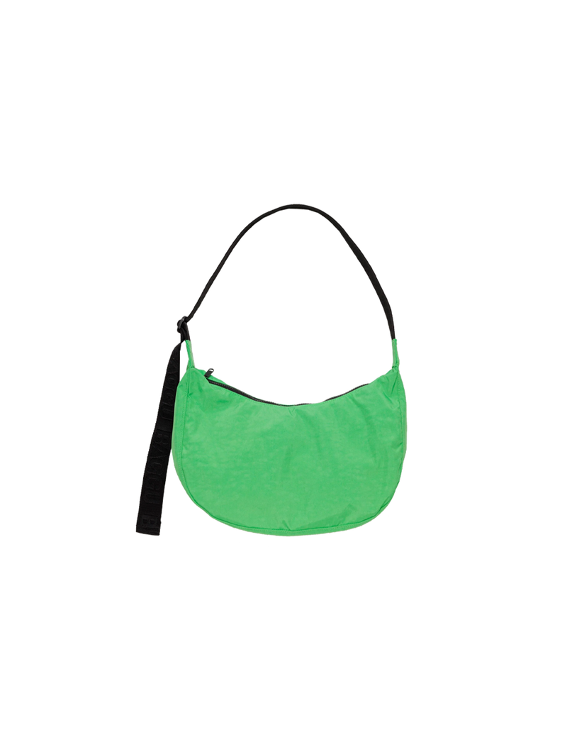  MEDIUM NYLON CRESCENT BAG ALOE GREEN | Crescent shaped nylon bag with a feature 'BAGGU' strap. An adjustable strap gives you multiple ways and lengths to wear this bag.