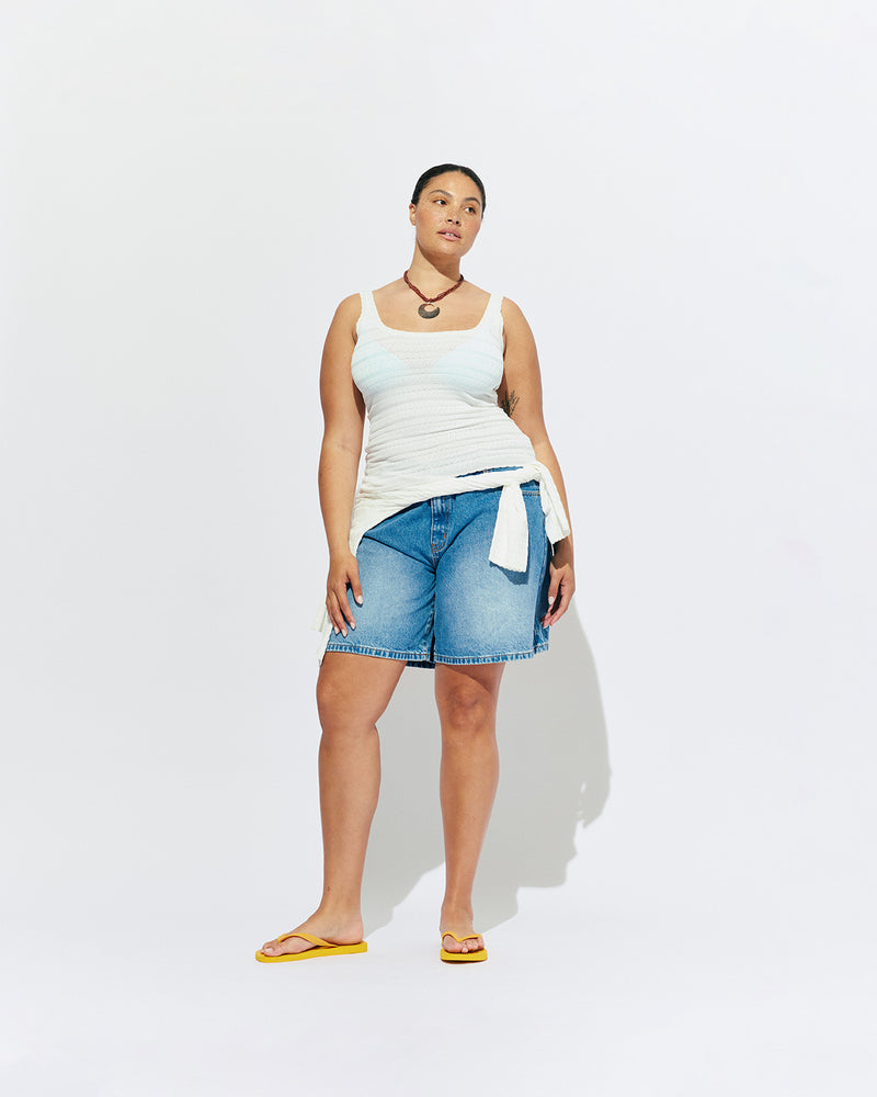 BAMBI TANK WHITE | An update on our Rubette favourite Beau Tank, the Bambi tank features a scoop neck design, in a lightweight white knit. Make it a matching set with the Bambi Cardigan or pair with your favourite shorts.