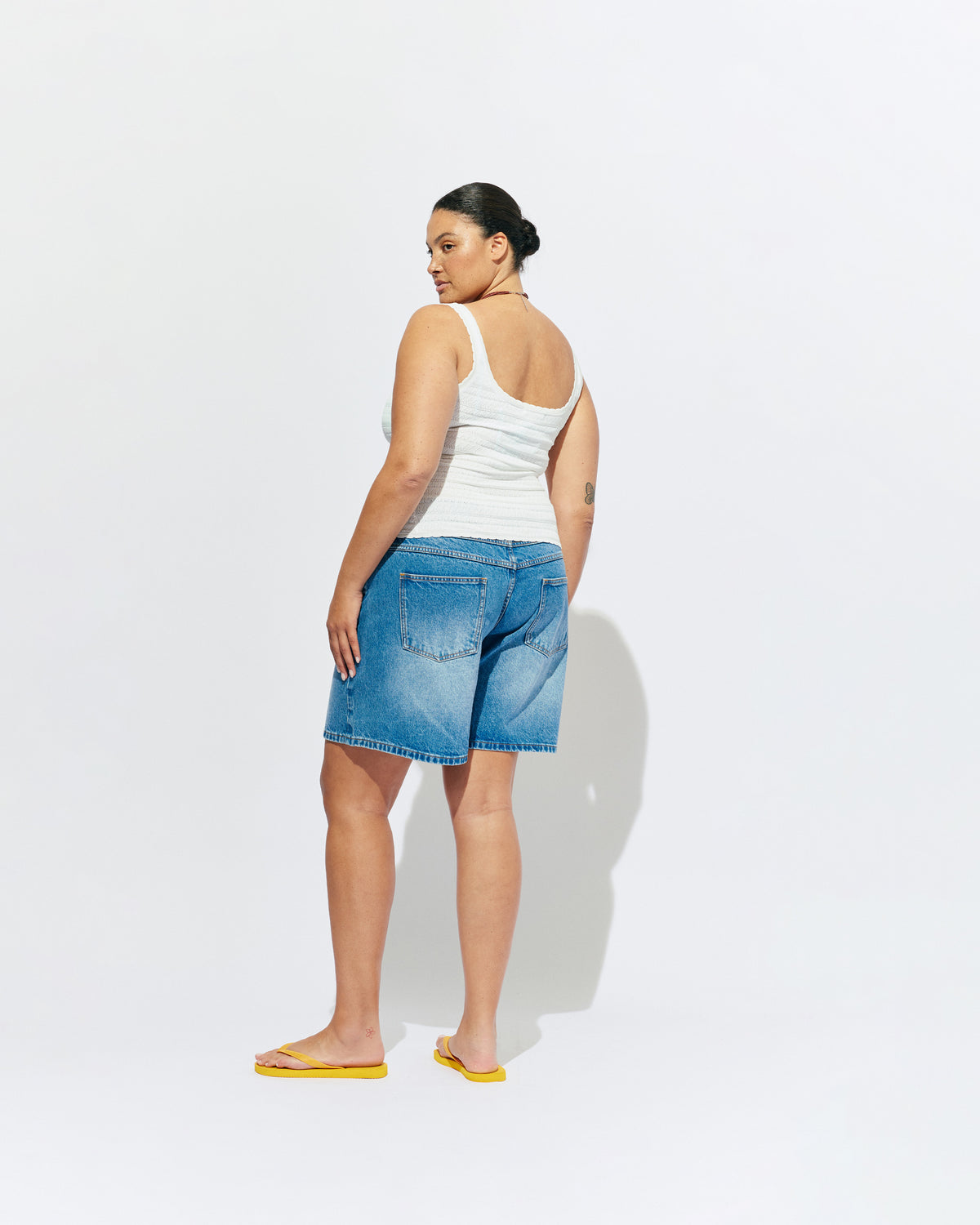 BAMBI TANK WHITE | An update on our Rubette favourite Beau Tank, the Bambi tank features a scoop neck design, in a lightweight white knit. Make it a matching set with the Bambi Cardigan or pair with your favourite shorts.