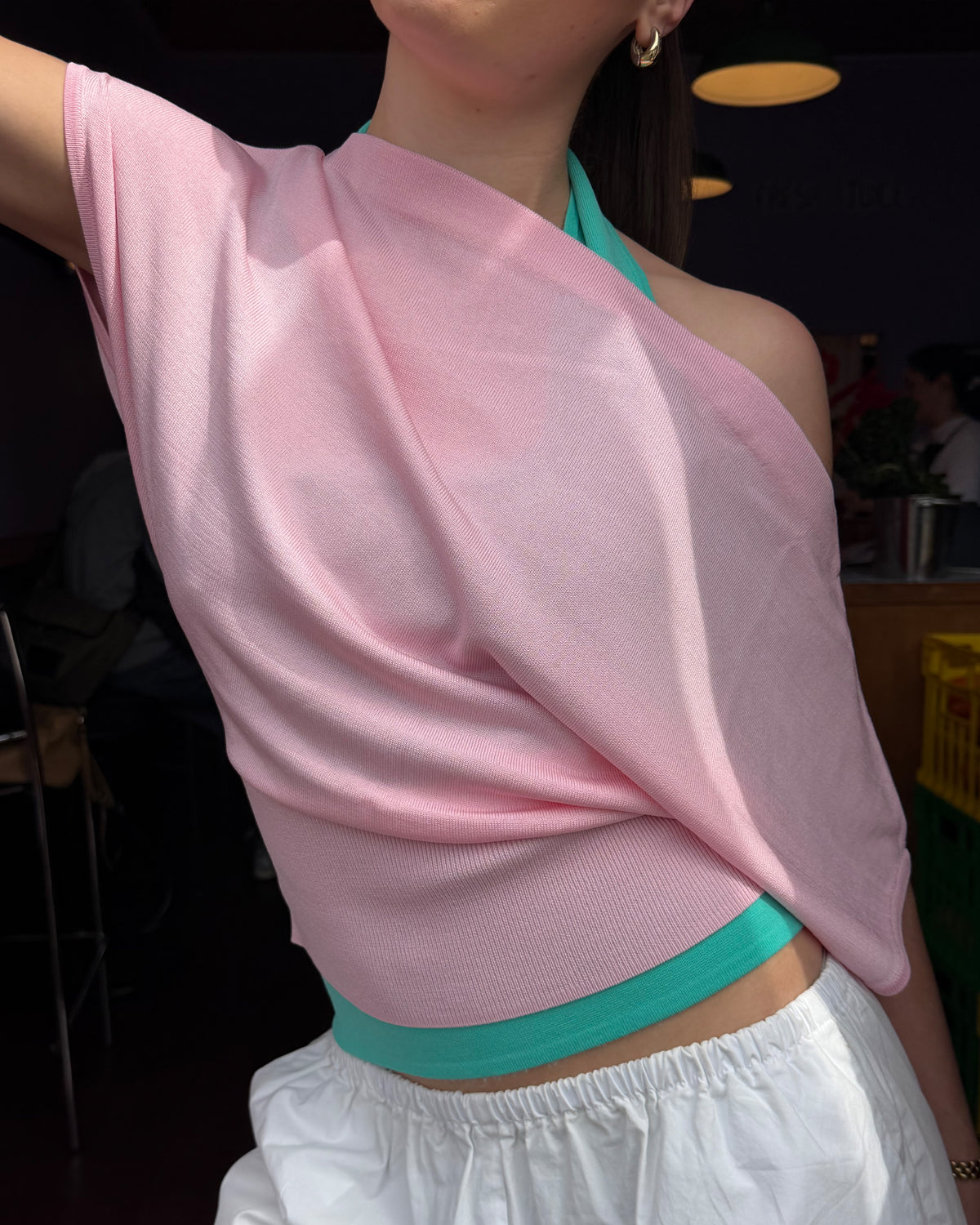BODE BATWING SHORT SLEEVE TOP PINK | Off-shoulder batwing short sleeve top crafted in a mid-weight pink knit. This top is simple yet elevated and can be worn on or off the shoulder. Pair it with denim for a chic everyday look.