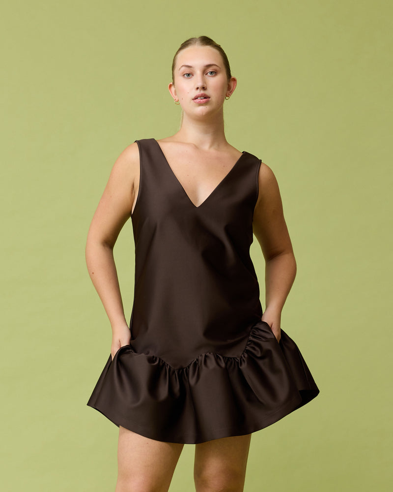 SAKURA COCKTAIL DRESS JAVA | V-neck boxy fit mini dress with a low crossover back and ruffle hemline. Designed in a luxe heavy-weight satin, say hello to your new dream mini dress.