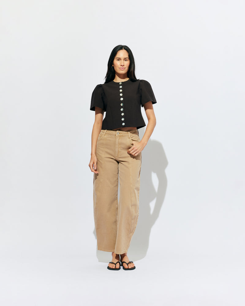 CAROLYN SHORT SLEEVE BLAZER ESPRESSO | Collarless short sleeve espresso blazer with feature pearlescent buttons.  An elevated classic with a structured silhouette, this top is the perfect addition to your everyday workwear rotation. Pair with the Carolyn Pant for a full suiting moment. 