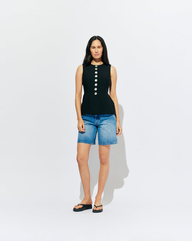 CAROLYN VEST BLACK | The Carolyn Vest is perfect for warmer months and layering, designed in a mid-weight black suiting fabric. With tailored shaping on the waist and a built-in waist tie, pair with your favourite shorts or our Carolyn Pant for an effortlessly...