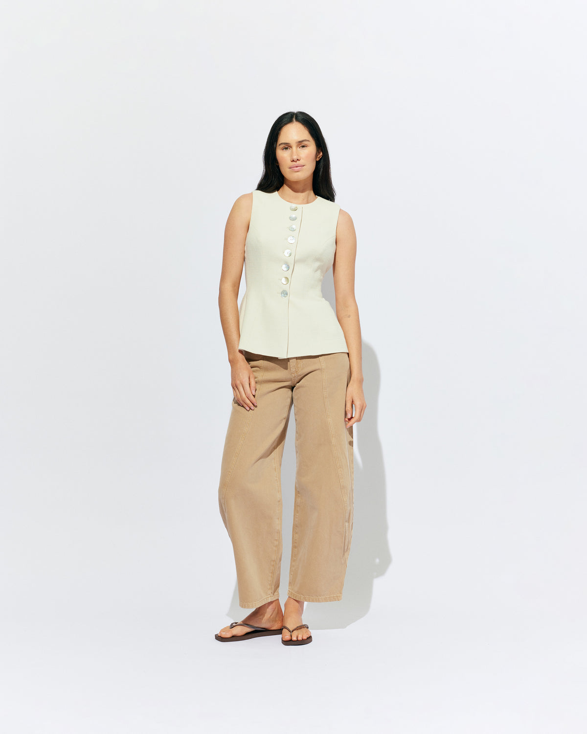 CAROLYN VEST CREAM | The Carolyn Vest is perfect for warmer months and layering, designed in a mid-weight black suiting fabric. Pair with your favourite shorts or suit trouser for an effortlessly polished look. Part of our workwear collection, the Carolyn Vest is a...