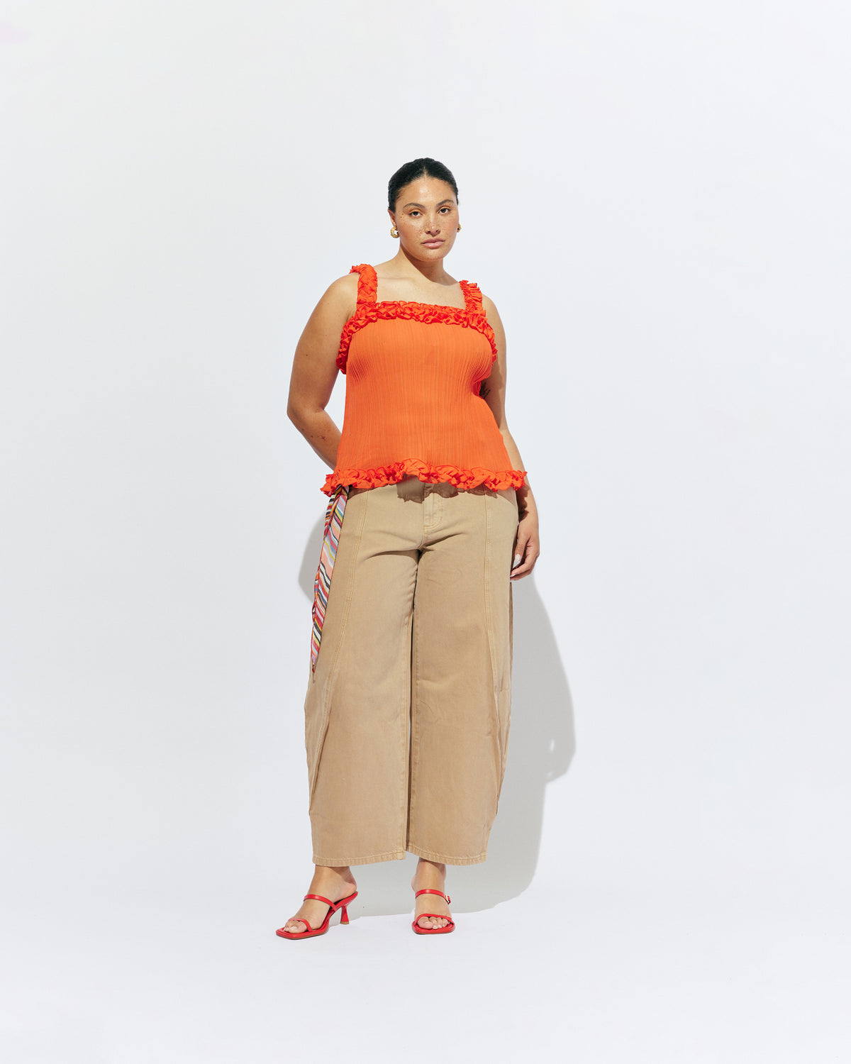 CHELSEA CRINKLE CAMI VERMILLION | A new arrival to our Chelsea Crinkle story, this vermillion recycled chiffon cami features ruffles along all the seams. This top is the perfect statement piece for any occasion: layered with a singlet for the office, or showing off your Liam...