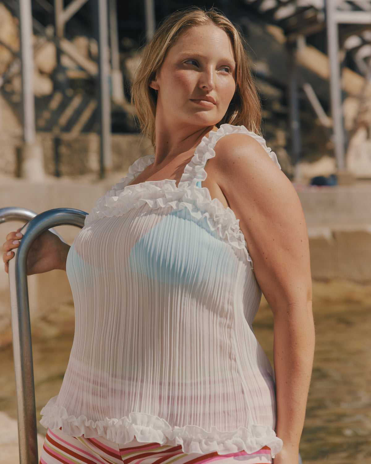 CHELSEA CRINKLE CAMI WHITE | A new arrival to our Chelsea Crinkle story, this white recycled chiffon cami features ruffles along all the seams. This top is the perfect statement piece for any occasion: layered with a singlet for the office, or showing off your...
