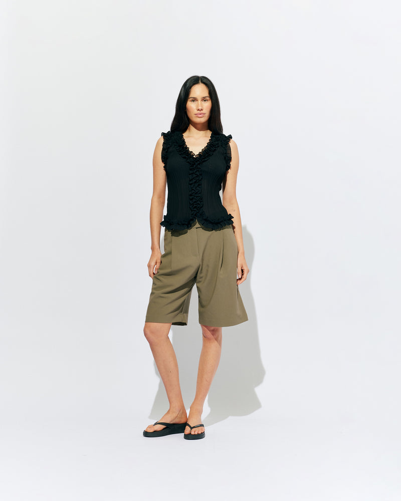 COCO SUIT SHORT MARTINI OLIVE | Classic suiting short designed in a midweight martini olive green, featuring front pleats, pockets and a wide leg. Make it a matching set with our Coco Short Sleeve Blazer or Carolyn Short Sleeve Blazer.
