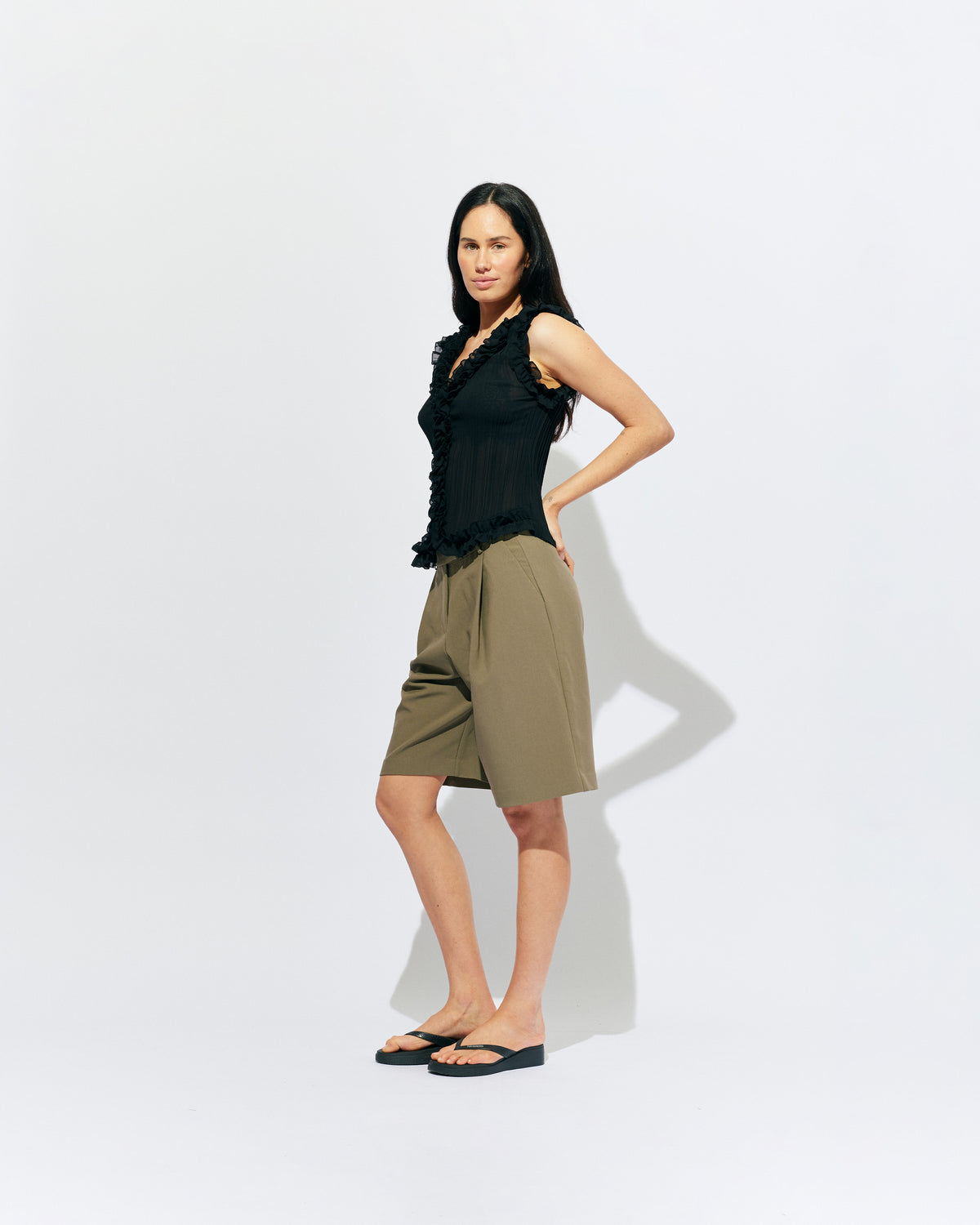 CHELSEA CRINKLE TANK BLACK | An update on our Chelsea Crinkle Top, this black recycled chiffon tank features ruffles along all the seams and is the perfect statement piece for any occasion, from office-wear to a night out. Pair it with your favourite skirt or...