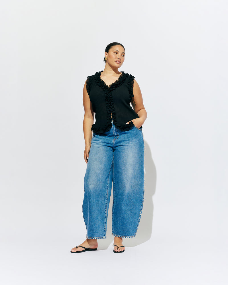 CHELSEA CRINKLE TANK BLACK | An update on our Chelsea Crinkle Top, this black recycled chiffon tank features ruffles along all the seams and is the perfect statement piece for any occasion, from office-wear to a night out. Pair it with your favourite skirt or...