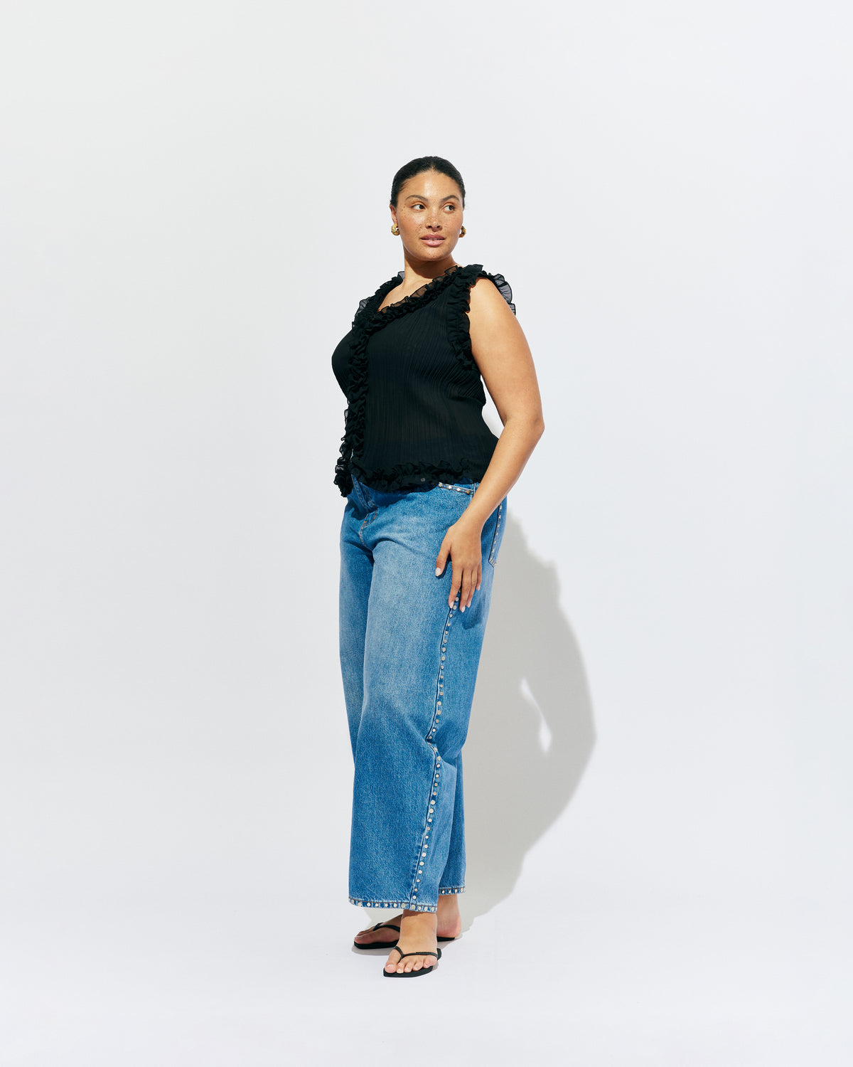CHELSEA CRINKLE TANK BLACK | An update on our Chelsea Crinkle Top, this black recycled chiffon tank features ruffles along all the seams and is the perfect statement piece for any occasion, from office-wear to a night out. Pair it with your favourite skirt or...