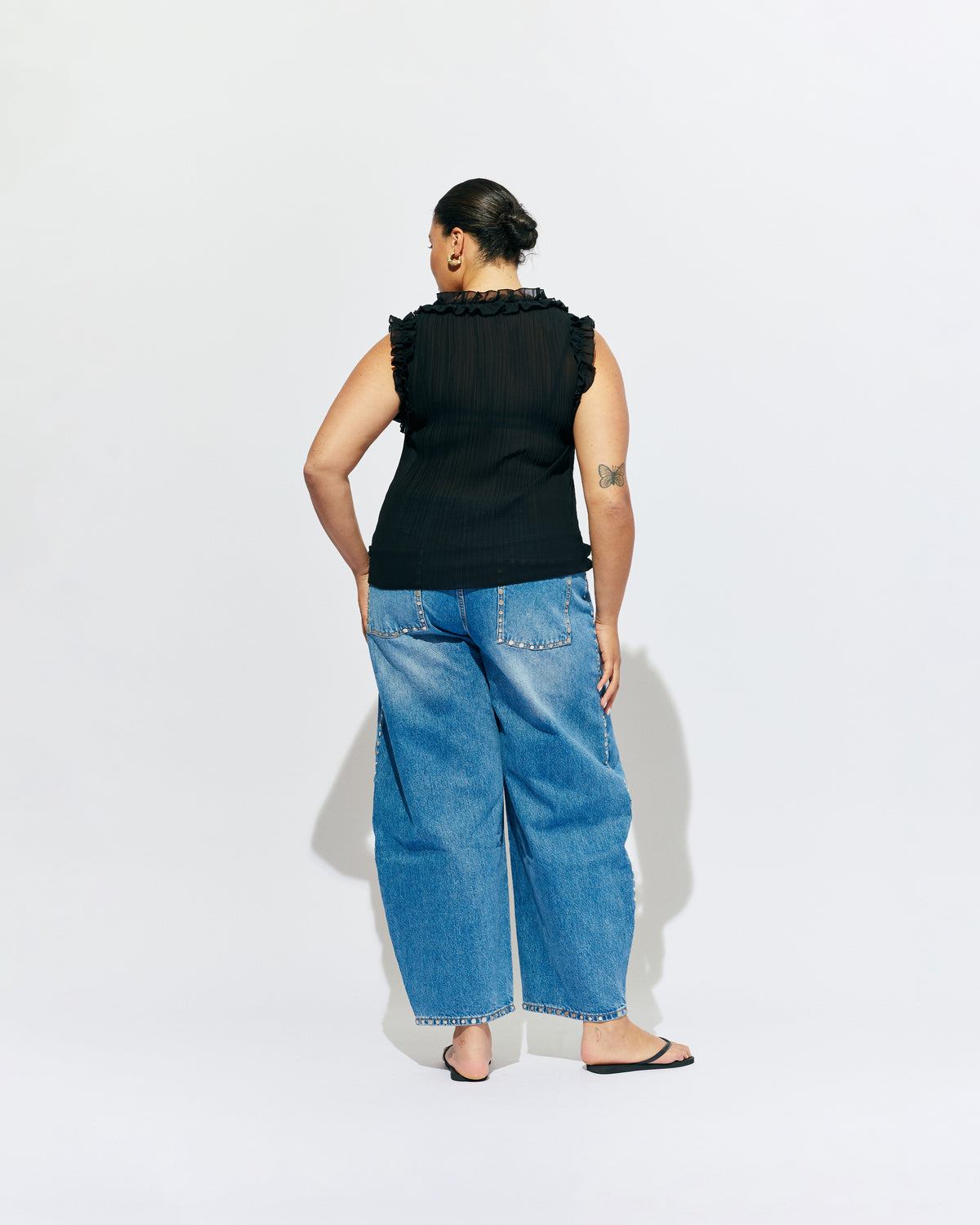 CHELSEA CRINKLE TANK BLACK | An update on our Chelsea Crinkle Top, this black recycled chiffon tank features ruffles along all the seams and is the perfect statement piece for any occasion, from office-wear to a night out. Pair it with your favourite skirt or...