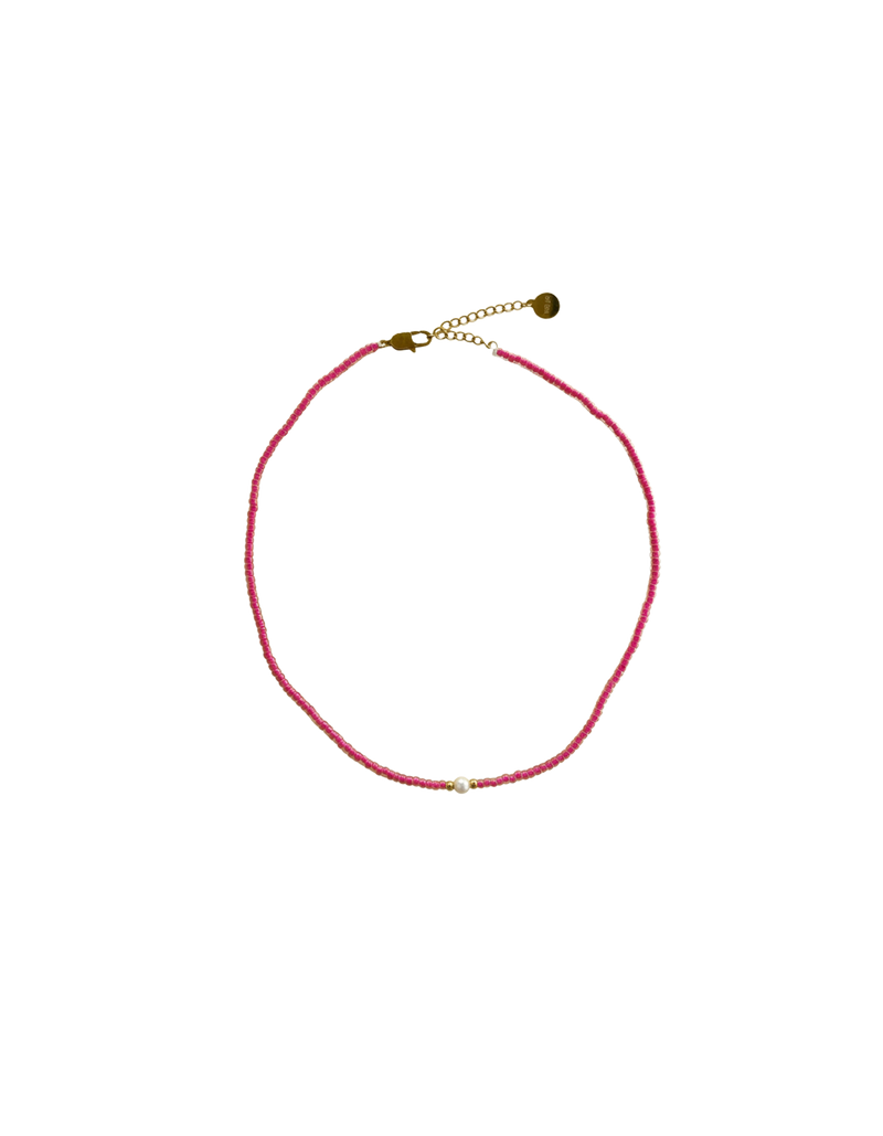 CHILLI NECKLACE ROSIE | Delicate beaded necklace designed with red glass beads and a feature pearl. The perfect layering piece or pop of colour to complete your outfit. 