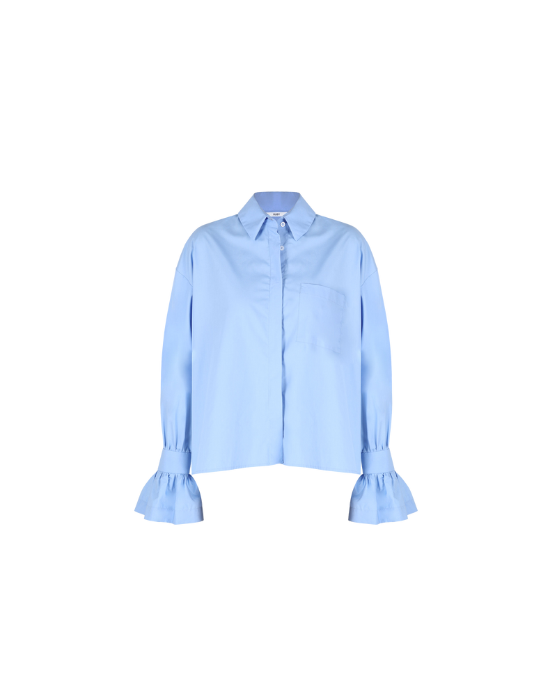 COMET SHIRT CORNFLOWER | Boxy shaped shirt that sits longer through the back with fluted cuff detailing cut in a crisp cornflower cotton. Designed to be a stand out, the fabric of this shirt...