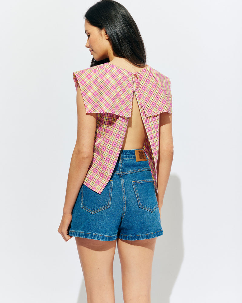 CRUSH COTTON BLOUSE PINK YELLOW TARTAN | Sleeveless blouse featuring an oversized sailor-style collar with a scalloped hem and broderie detailing on the sides, designed in our organic cotton pink yellow tartan. Features a button up design at the back, which can be worn open to keep...