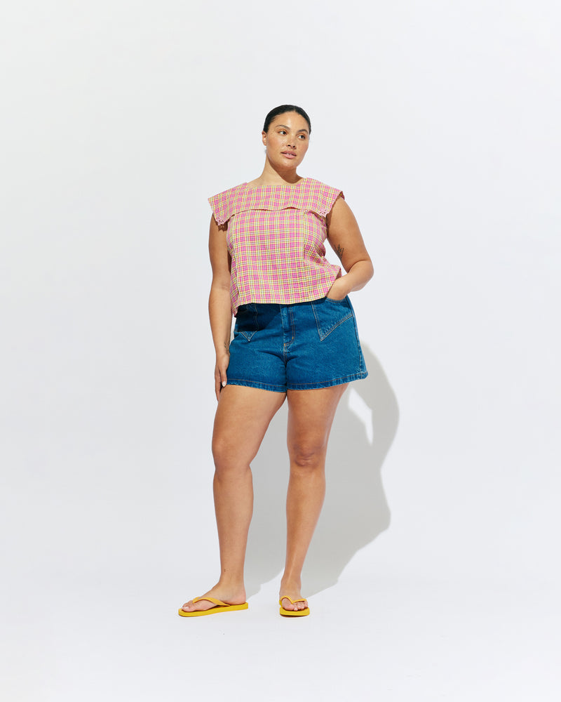 CLOVER DENIM SHORT INDIGO | Classic high waisted denim short with retro four pocket detailing and contrast top stitching. Made in a soft washed indigo denim, these are an essential summer companion for all Rubettes.