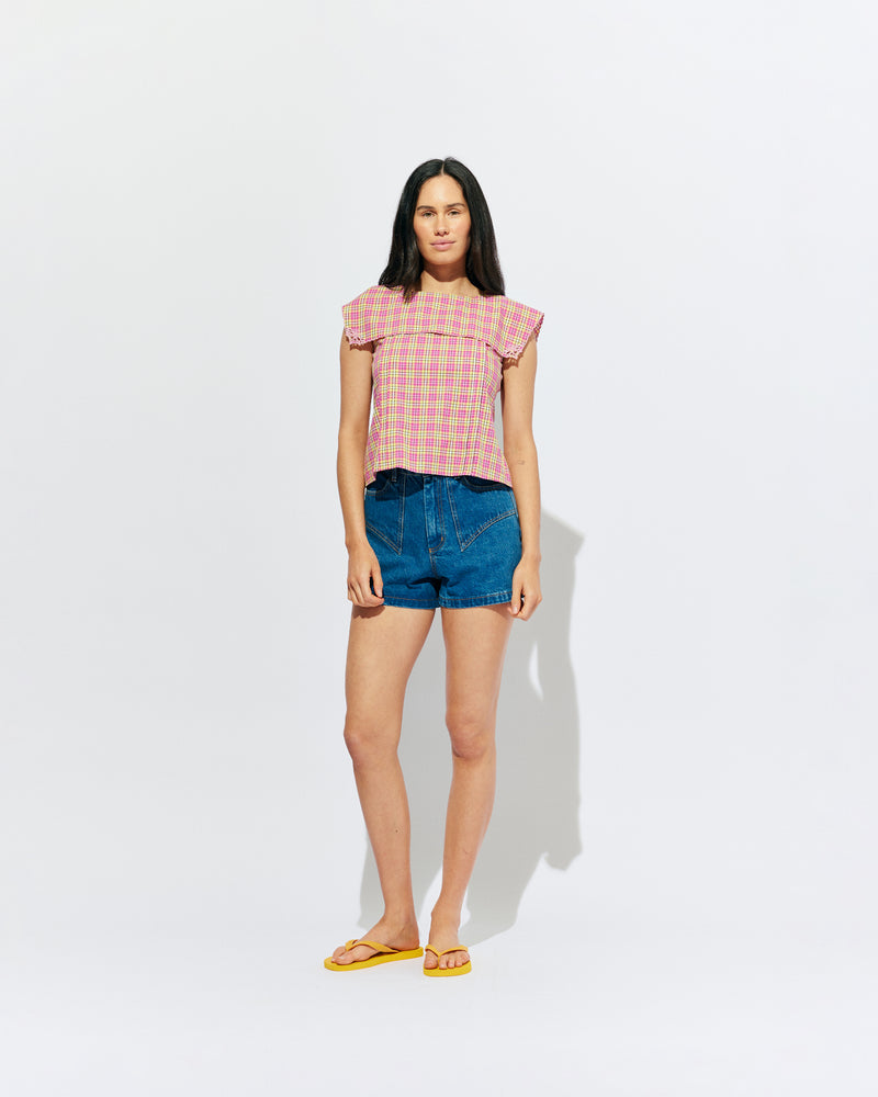 CLOVER DENIM SHORT INDIGO | Classic high waisted denim short with retro four pocket detailing and contrast top stitching. Made in a soft washed indigo denim, these are an essential summer companion for all Rubettes.