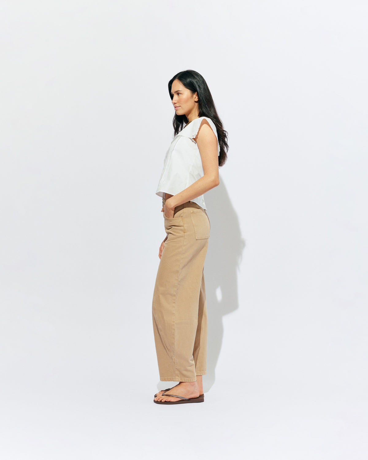 BUZZ JEAN SANDWASH | Your new everyday go-to, the Buzz Jean is a barrel-leg style pant, designed in a sandwash denim. Sits mid-waisted and features panel detailing down the front that wraps to the side seam.