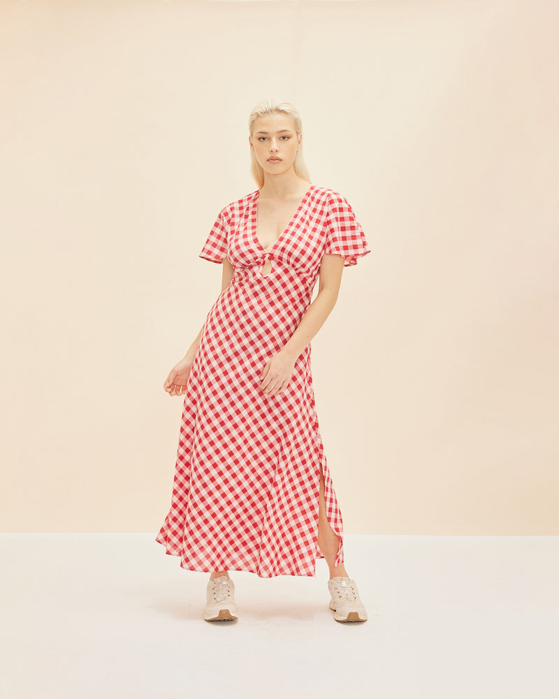 CLOVER MIDI DRESS RED GINGHAM | V-neck midi dress with front keyhole detail, made in a lightweight cotton gingham. Fitted around the waist flowing to an A-line skirt, this dress is a timeless piece.