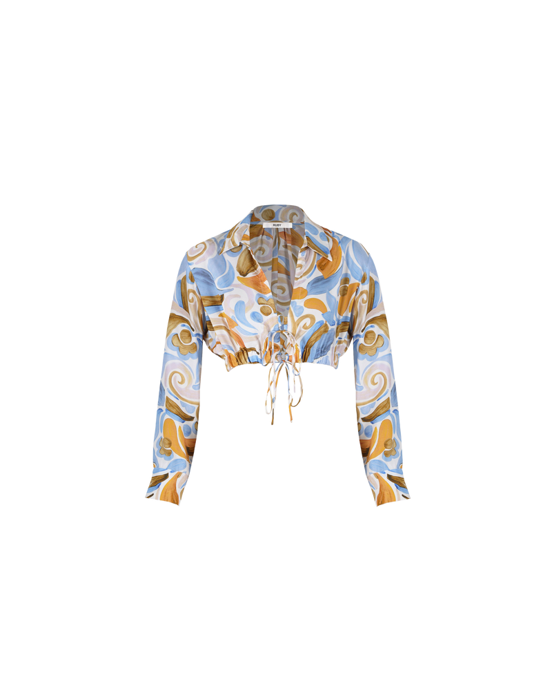 DYLAN CROP SHIRT CERAMIC | Longsleeved crop shirt with an elasticated waist and front tie closures crafted in a RUBY exclusive ceramic print. A modern take on classic tailoring, resulting in a playful crop with...