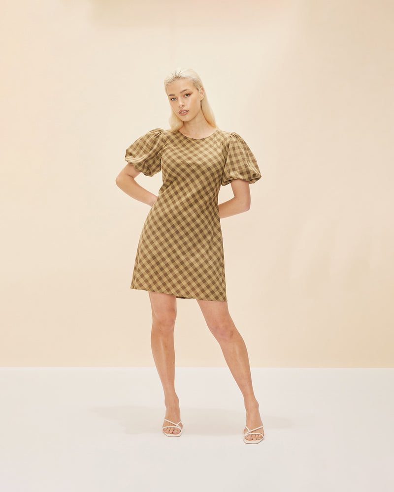 DARCY GINGHAM MINIDRESS OLIVE GINGHAM | Bias cut cotton minidress with puff sleeves and an open back feature that ties back neck. The bias silhouette of this dress gently contours the body, while the olive check...