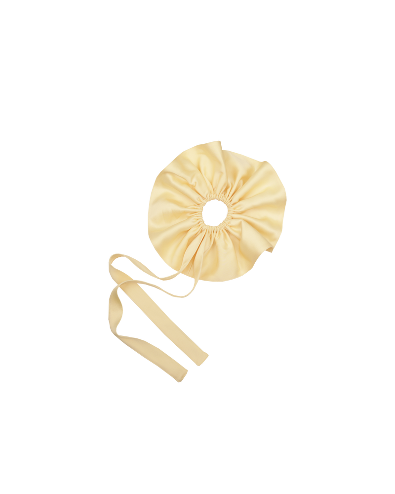 RUBY X EMMA JING SCRUNCHIE BUTTER | Oversized butter satin scrunchie featured as part of Summer Fling with Emma Jing, our Holiday 2024 collaboration with local Aotearoa designer, Emma Jing. A fun take on a classic scrunchie.