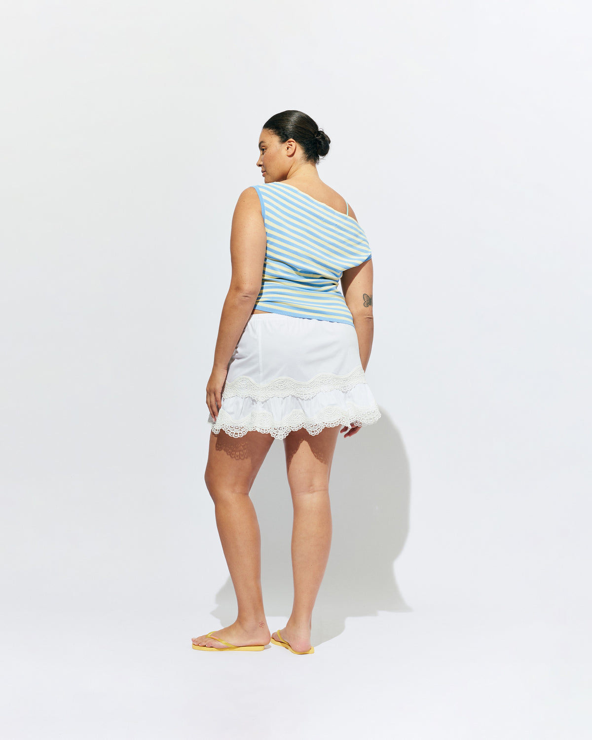 EMMA KNIT TOP BLUE BUTTER STRIPE | Off-shoulder knitted top crafted in a blue butter stripe, mid-weight knit. This top is simple yet fun and can be worn on or off the shoulder.