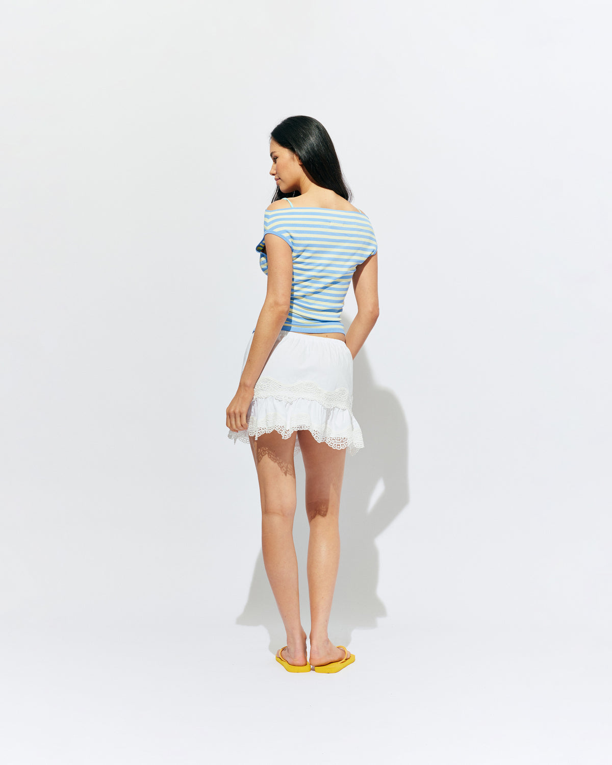 EMMA KNIT TOP BLUE BUTTER STRIPE | Off-shoulder knitted top crafted in a blue butter stripe, mid-weight knit. This top is simple yet fun and can be worn on or off the shoulder.