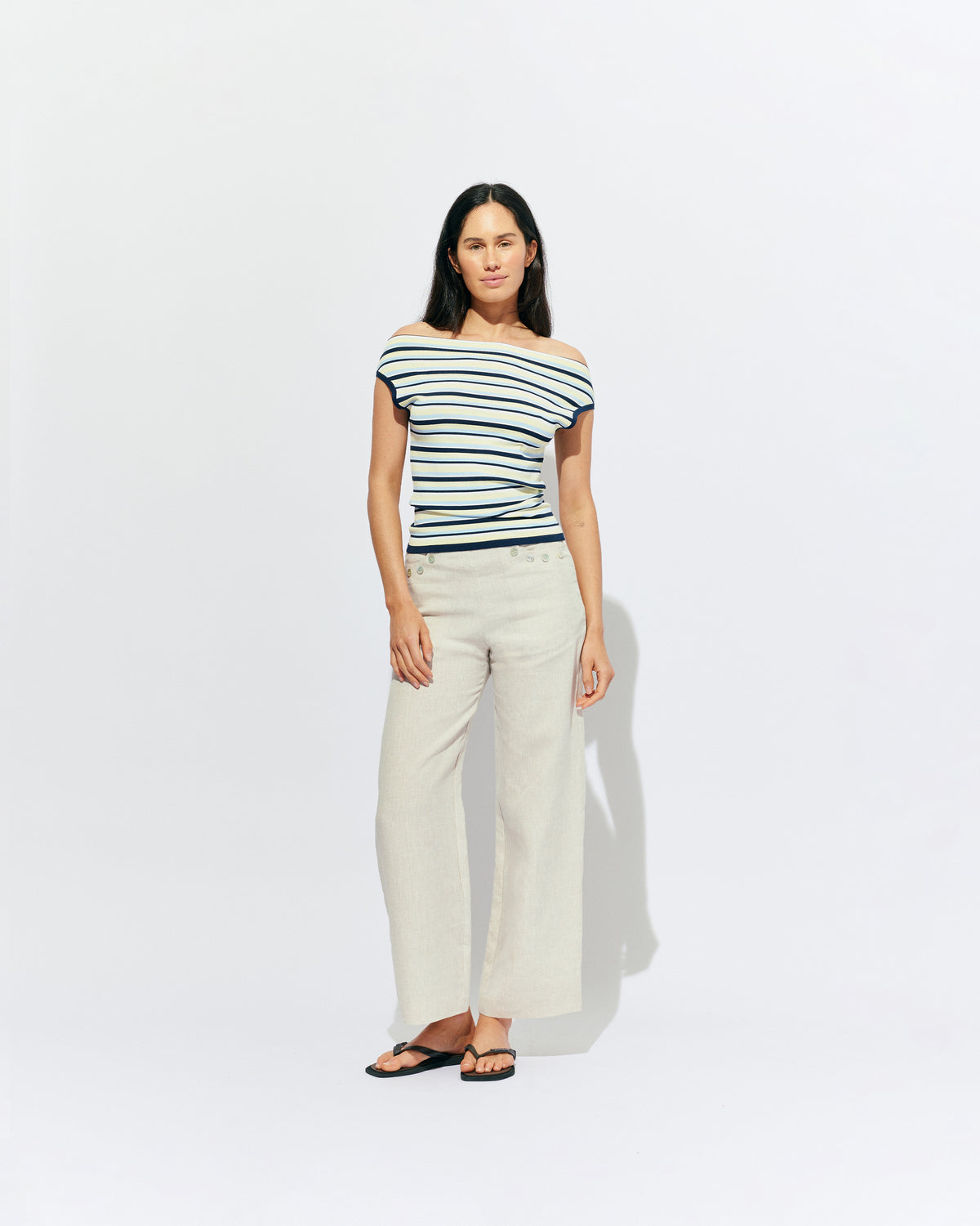 EMMA KNIT TOP LEMON NAVY STRIPE | Off-shoulder knitted top crafted in a lemon navy stripe, mid-weight knit. This top is simple yet fun and can be worn on or off the shoulder.