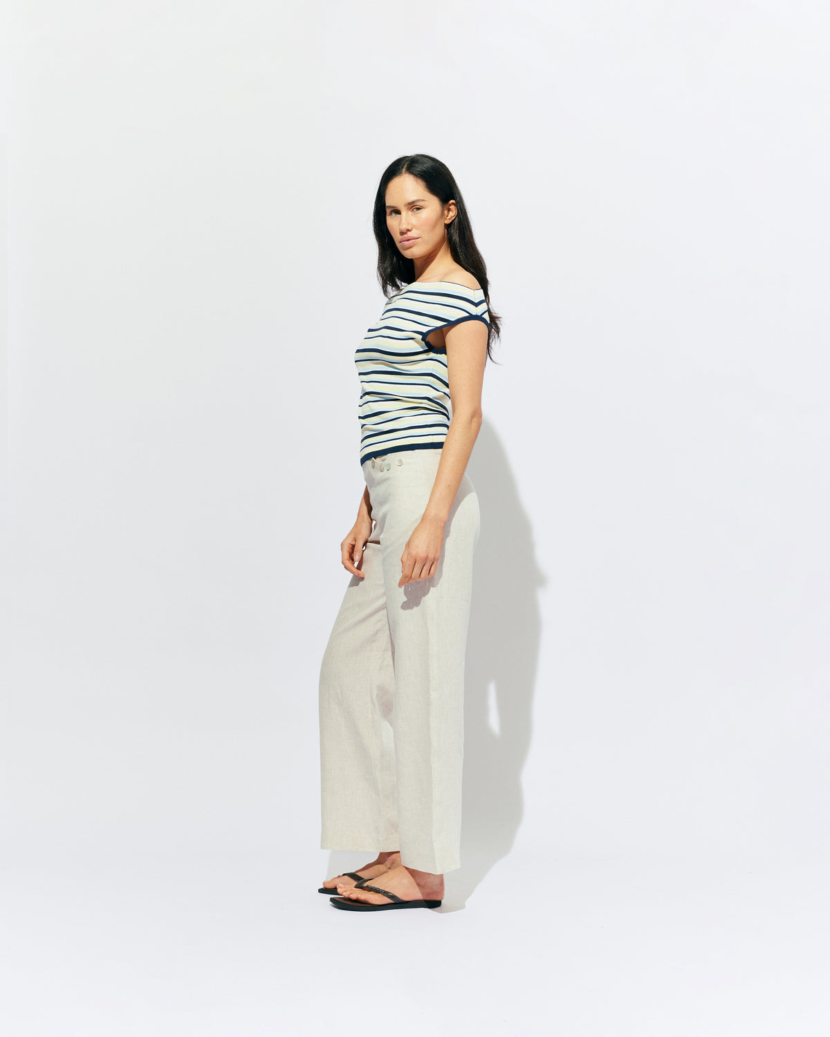 EMMA KNIT TOP LEMON NAVY STRIPE | Off-shoulder knitted top crafted in a lemon navy stripe, mid-weight knit. This top is simple yet fun and can be worn on or off the shoulder.