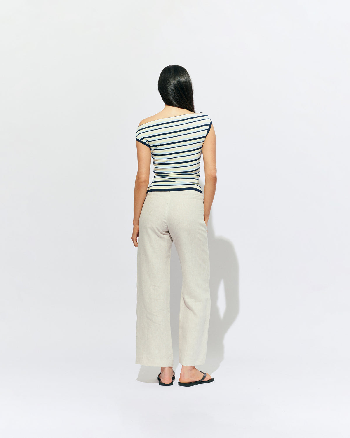 EMMA KNIT TOP LEMON NAVY STRIPE | Off-shoulder knitted top crafted in a lemon navy stripe, mid-weight knit. This top is simple yet fun and can be worn on or off the shoulder.