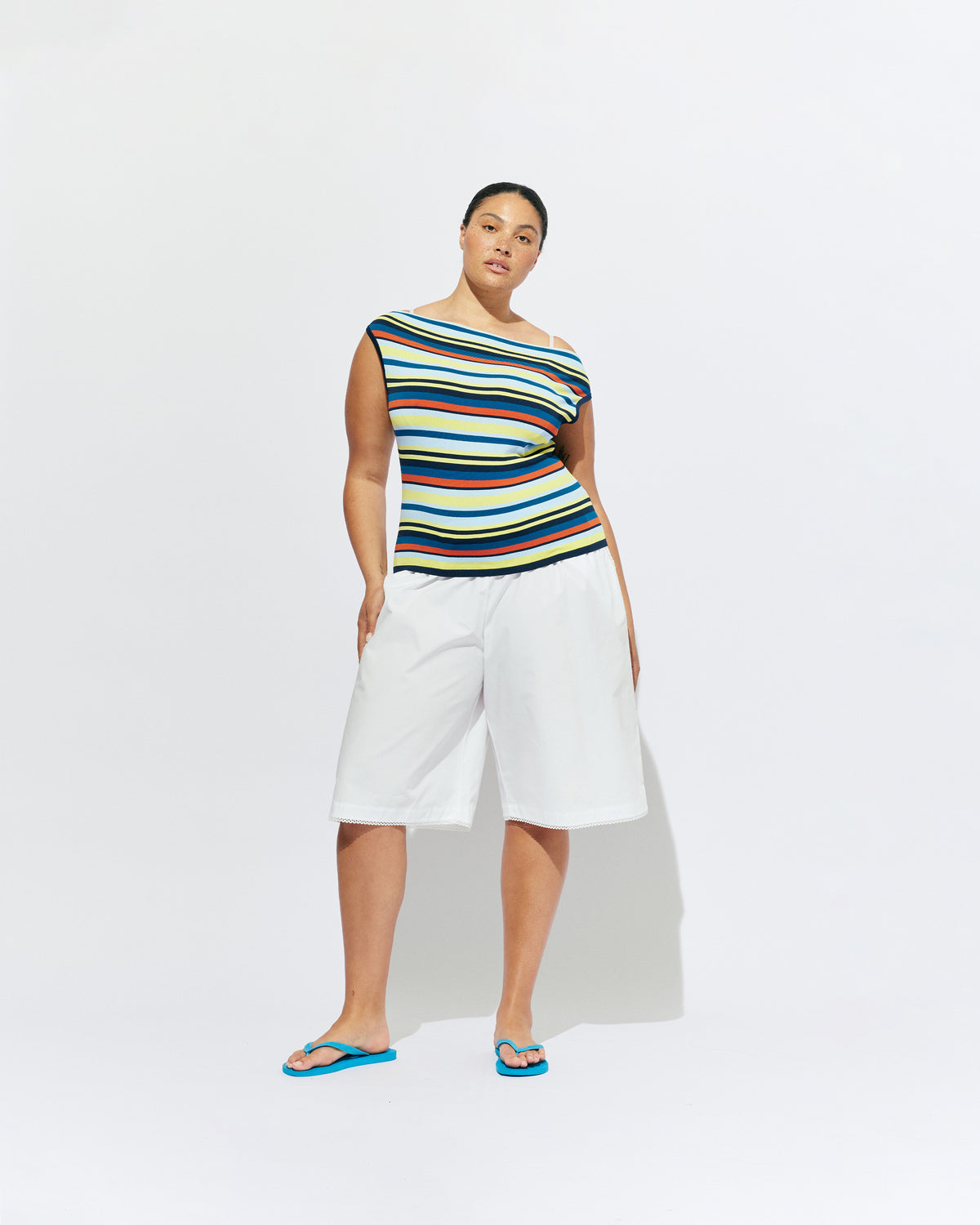 EMMA KNIT TOP MARINE STRIPE | Off-shoulder knitted top crafted in a marine stripe, mid-weight knit. This top is simple yet fun and can be worn on or off the shoulder.