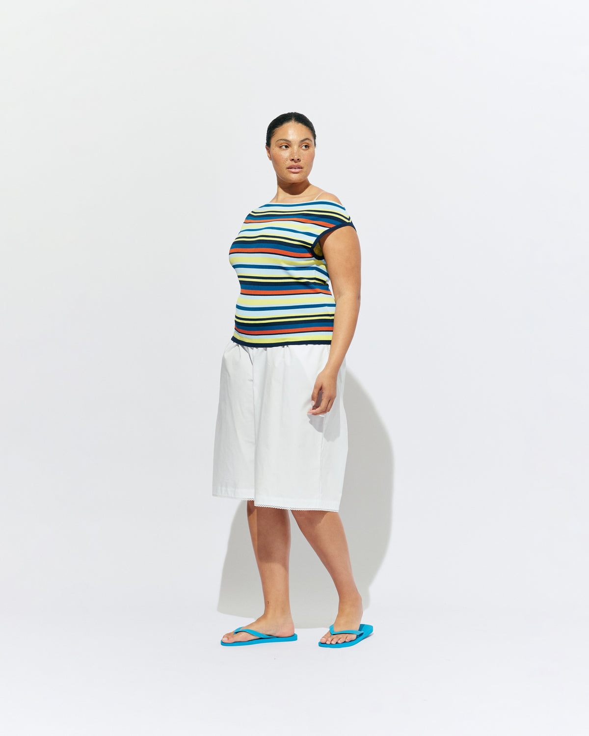 EMMA KNIT TOP MARINE STRIPE | Off-shoulder knitted top crafted in a marine stripe, mid-weight knit. This top is simple yet fun and can be worn on or off the shoulder.