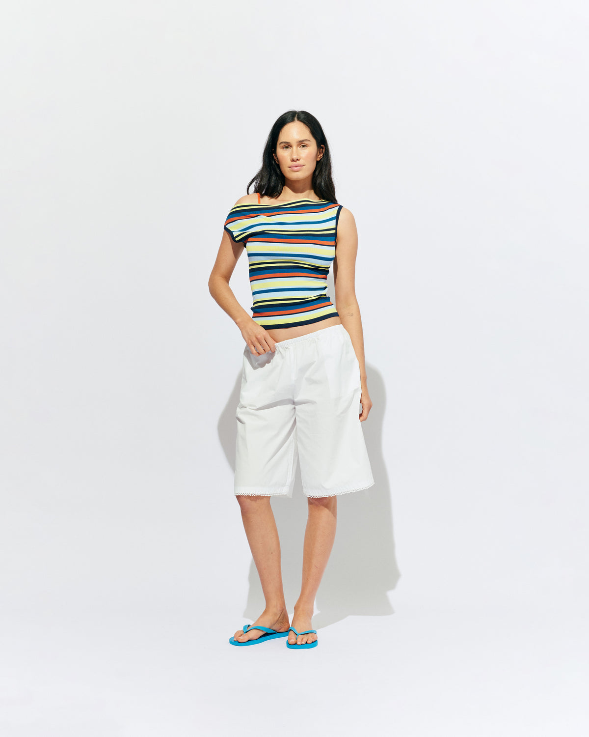 EMMA KNIT TOP MARINE STRIPE | Off-shoulder knitted top crafted in a marine stripe, mid-weight knit. This top is simple yet fun and can be worn on or off the shoulder.