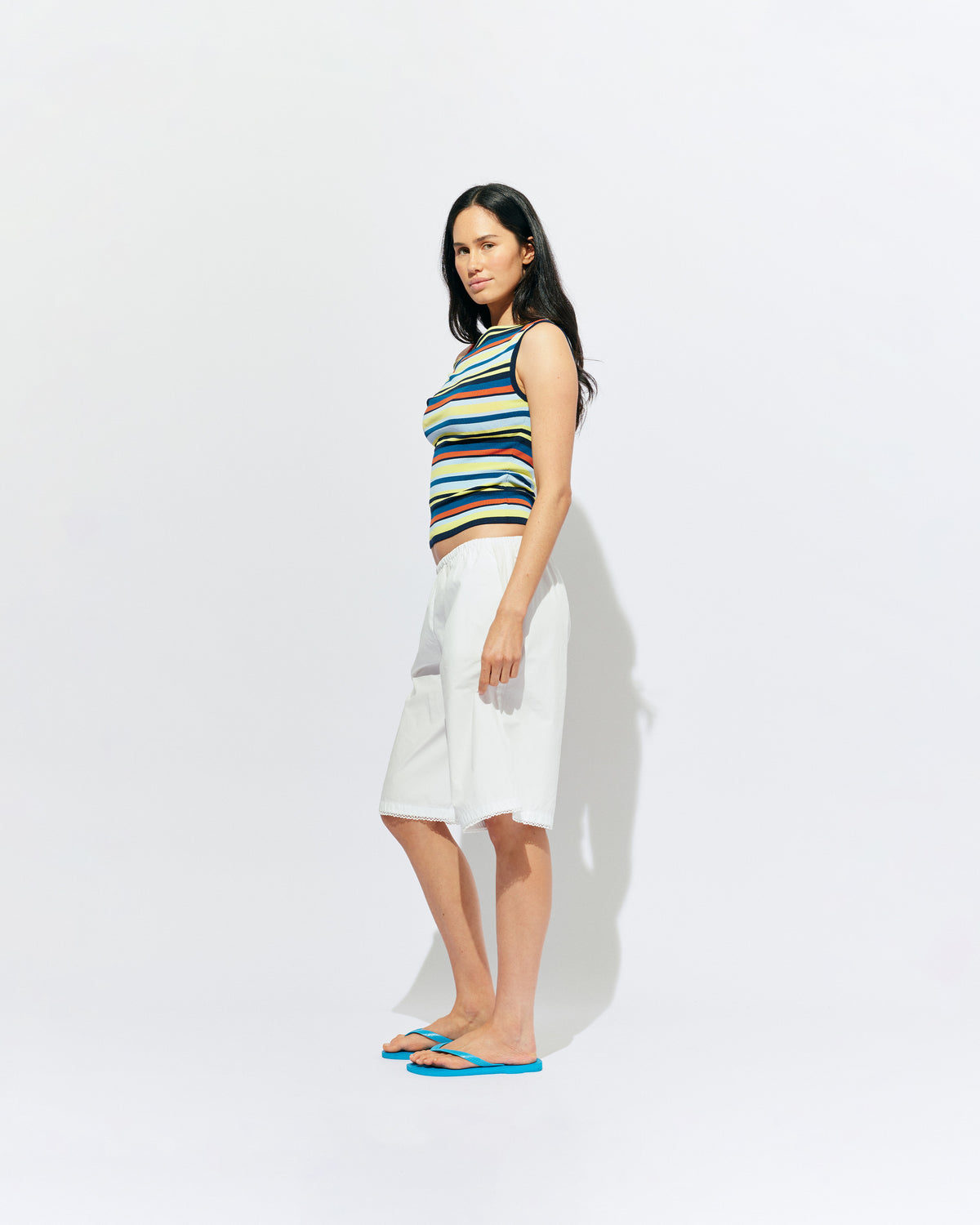 EMMA KNIT TOP MARINE STRIPE | Off-shoulder knitted top crafted in a marine stripe, mid-weight knit. This top is simple yet fun and can be worn on or off the shoulder.