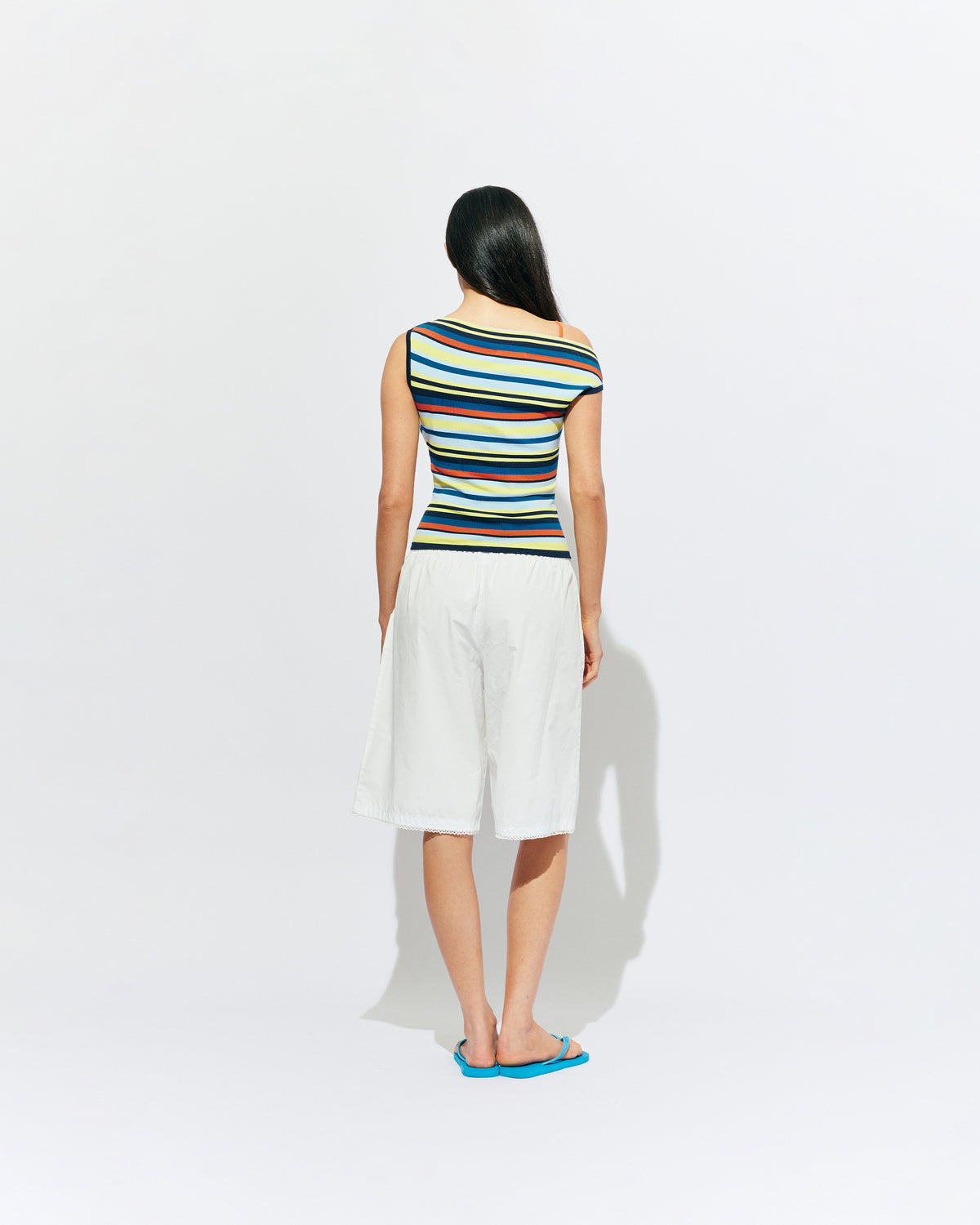 EMMA KNIT TOP MARINE STRIPE | Off-shoulder knitted top crafted in a marine stripe, mid-weight knit. This top is simple yet fun and can be worn on or off the shoulder.
